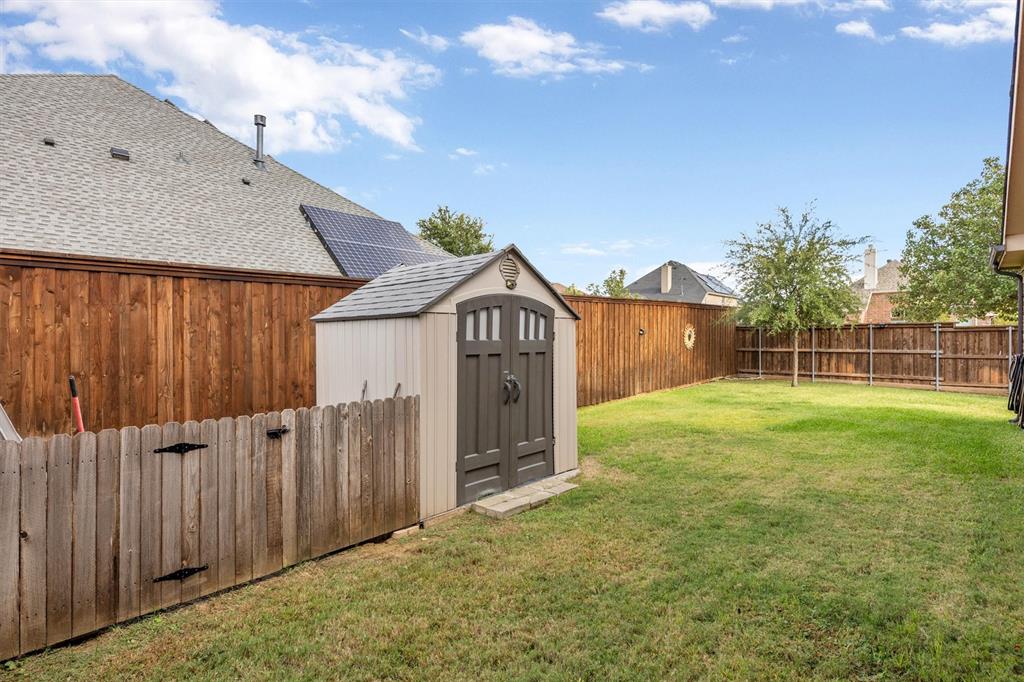The 8-ft board on board fence was installed in 2024 and the gates were moved up to create more privacy for the first floor bedrooms.