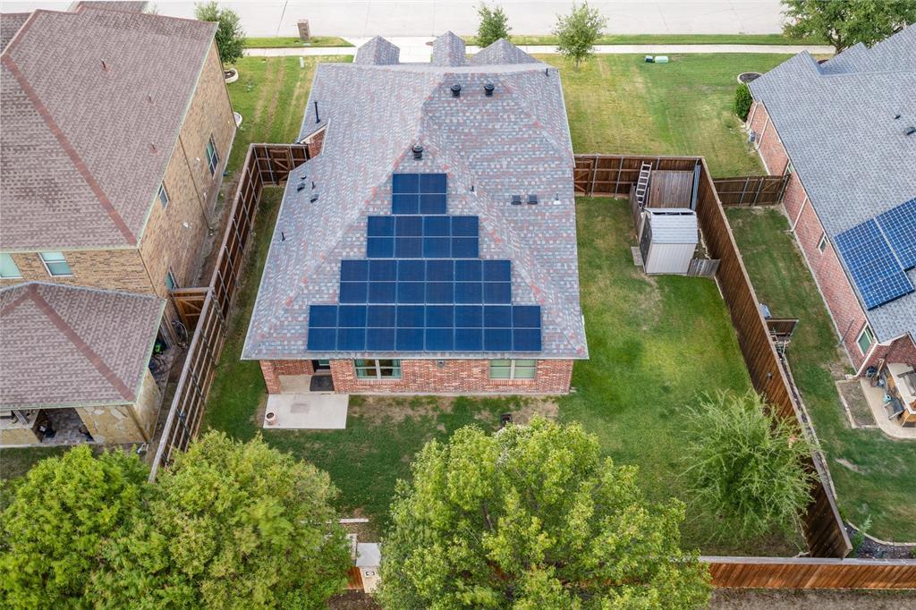 Solar panels AND solar screens provide extra energy efficiency. House faces northwest and southeast.