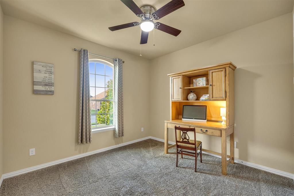 This is the larger of the two secondary bedrooms on the first floor that share the hall bath.