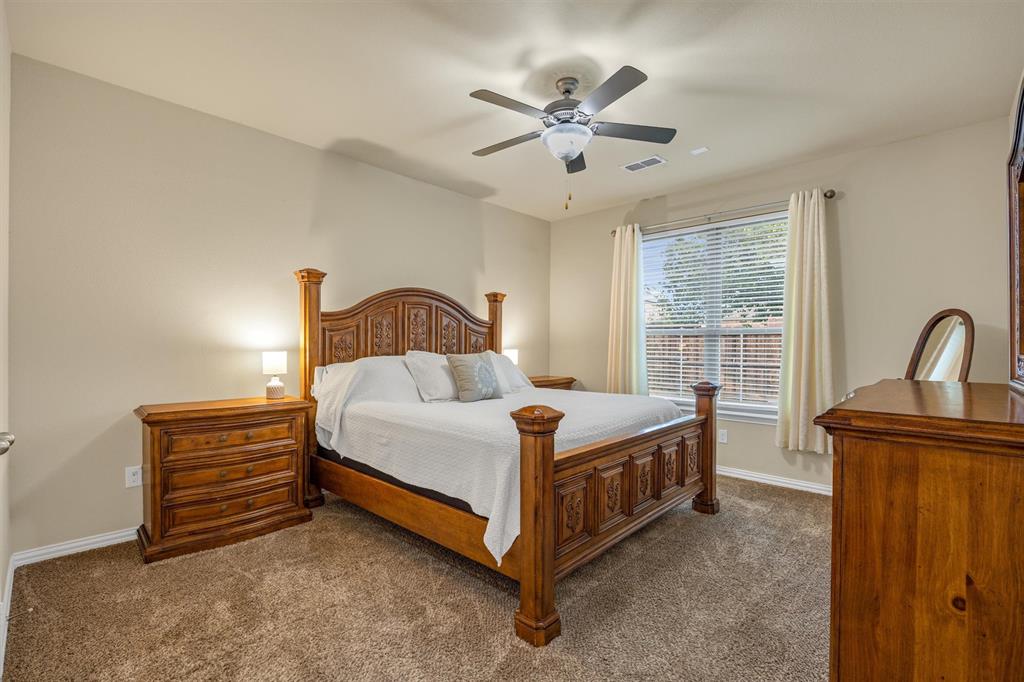 King size primary suite faces east and is shaded in the afternoons.