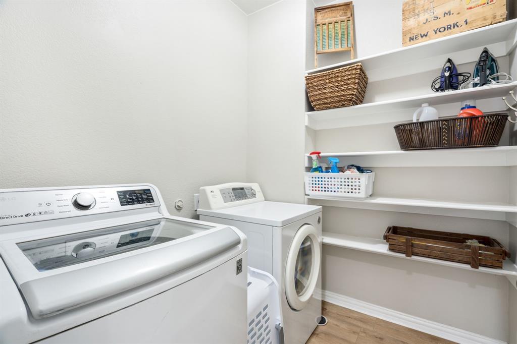 downstairs laundry with storage