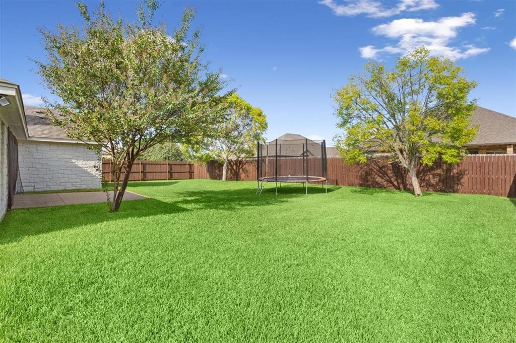 Fully fenced backyard