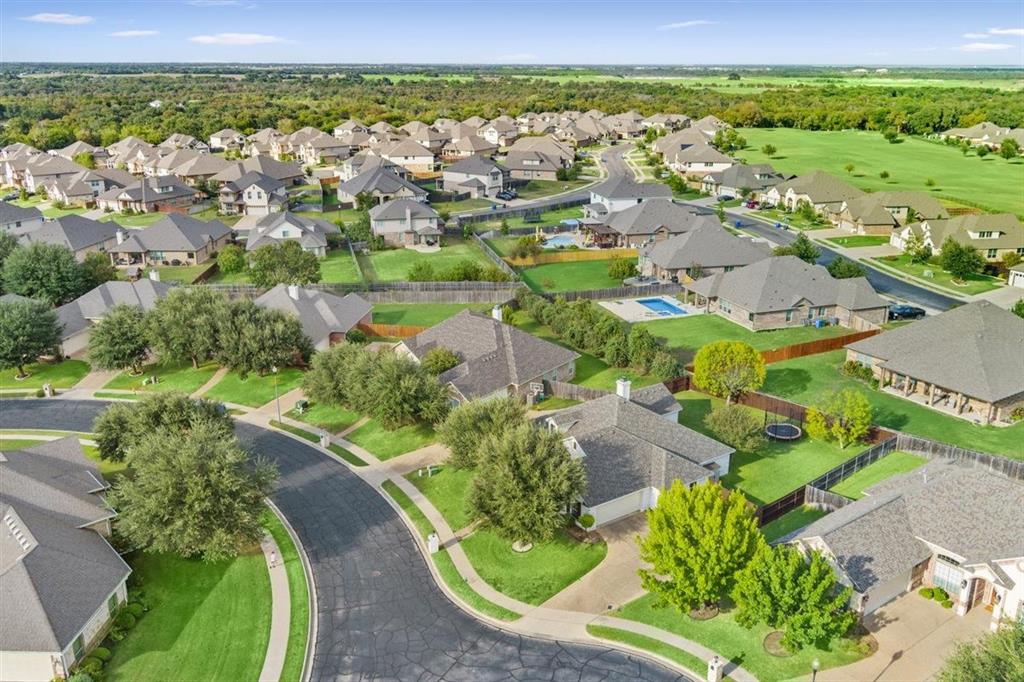 Aerial view of home and immediate neighborhood