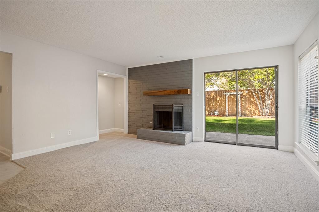 Family room opens to a large back yard.