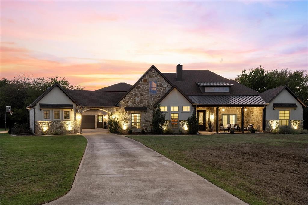 Welcome home to this incredible single story custom home on 2 plus acres!