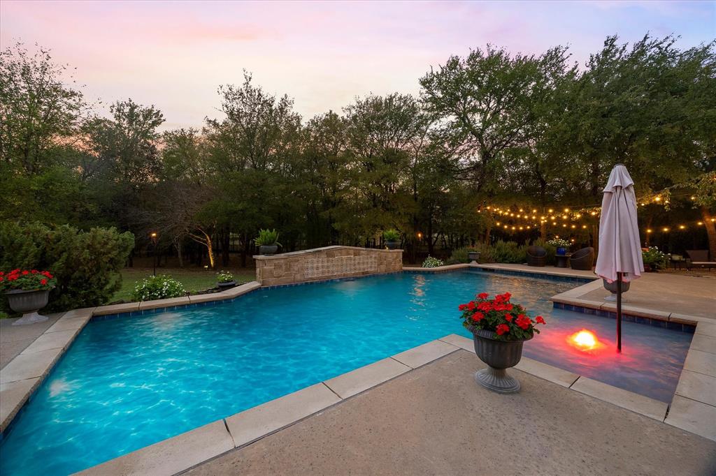 Enormous backyard includes totally wooded acreage to ensure your complete privacy!