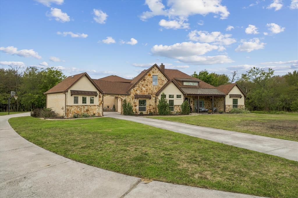 Extended circular drive provides ample parking for family and friends!