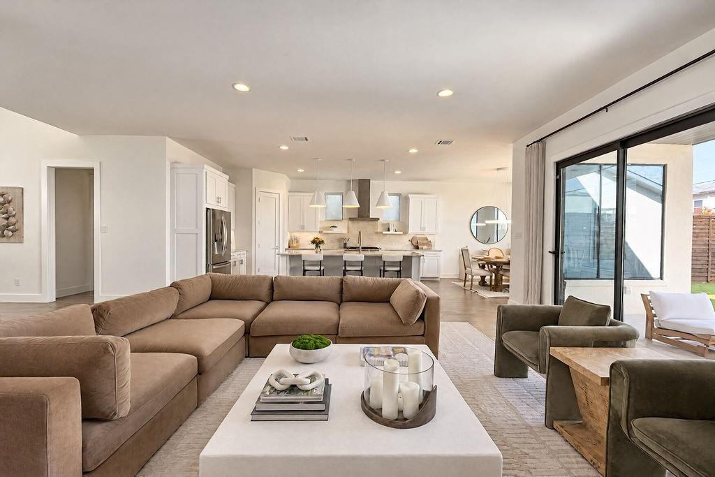 The main living area flows smoothly into the kitchen and back patio, making it simple to keep conversations going while entertaining