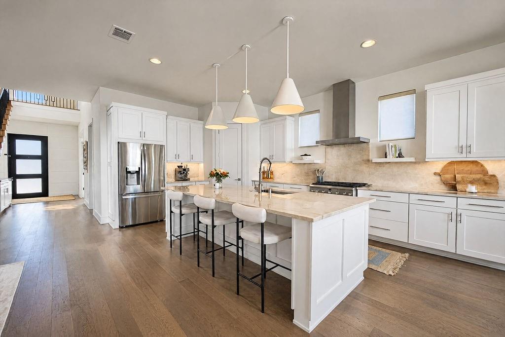 An undermount sink and ample prep space make cooking for a crowd feel simple and efficient