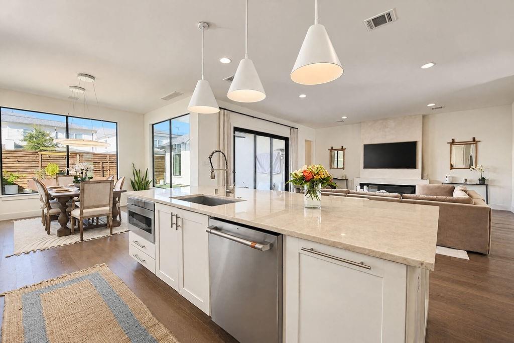 Several windows ensure your kitchen stays bright, airy, and fully stocked