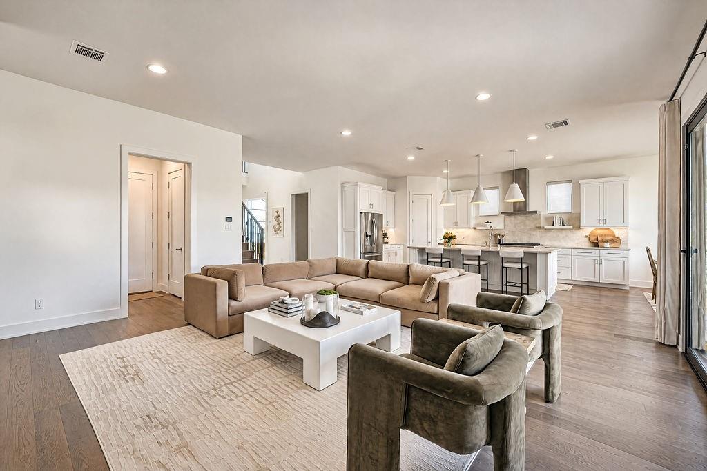 Generous square footage leaves plenty of room for oversized sectional seating, perfect for gathering for weekend movie nights