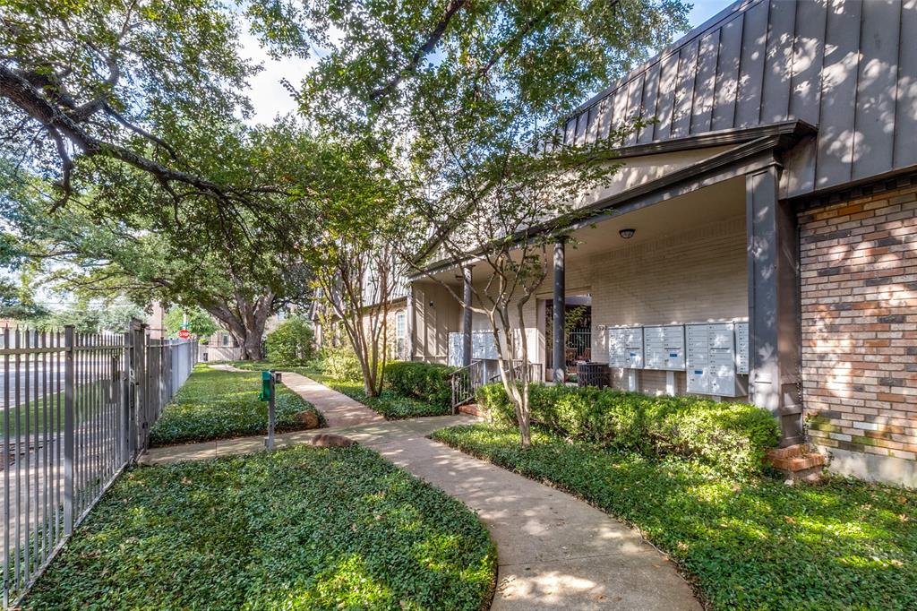 Community guest entry gate and walkway to condo