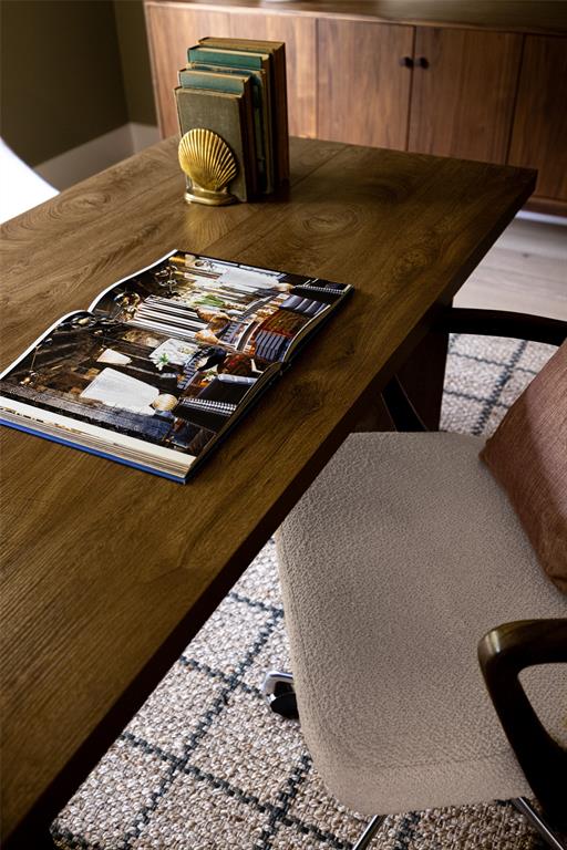 The dedicated home office offers a quiet, comfortable space for productivity and creativity.