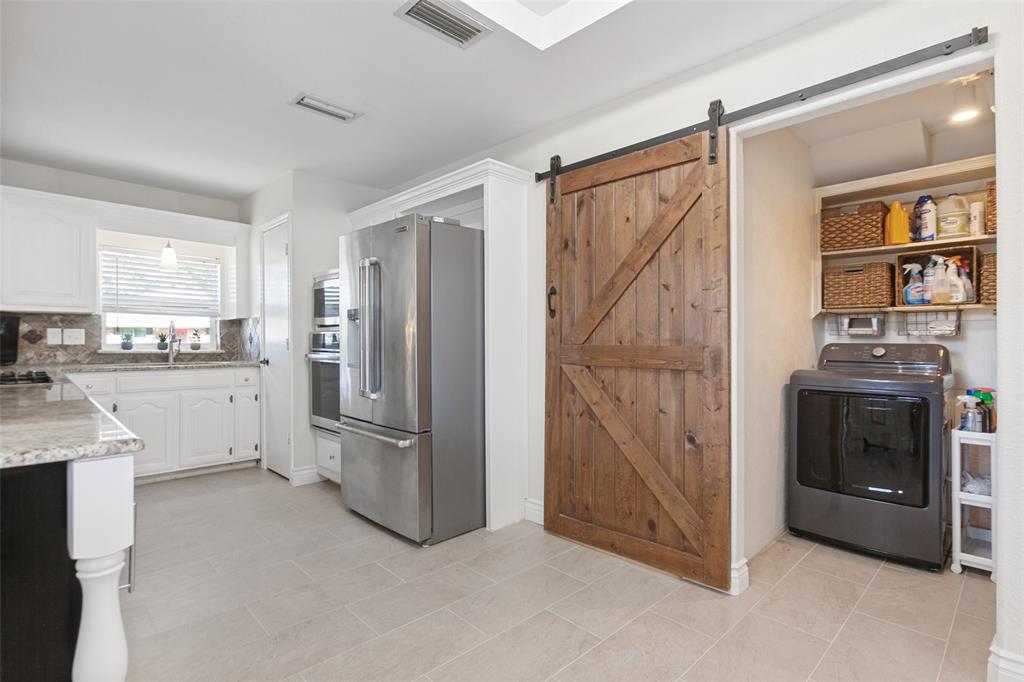 Easy to access laundry room, no need to walk through it to get to the garage!