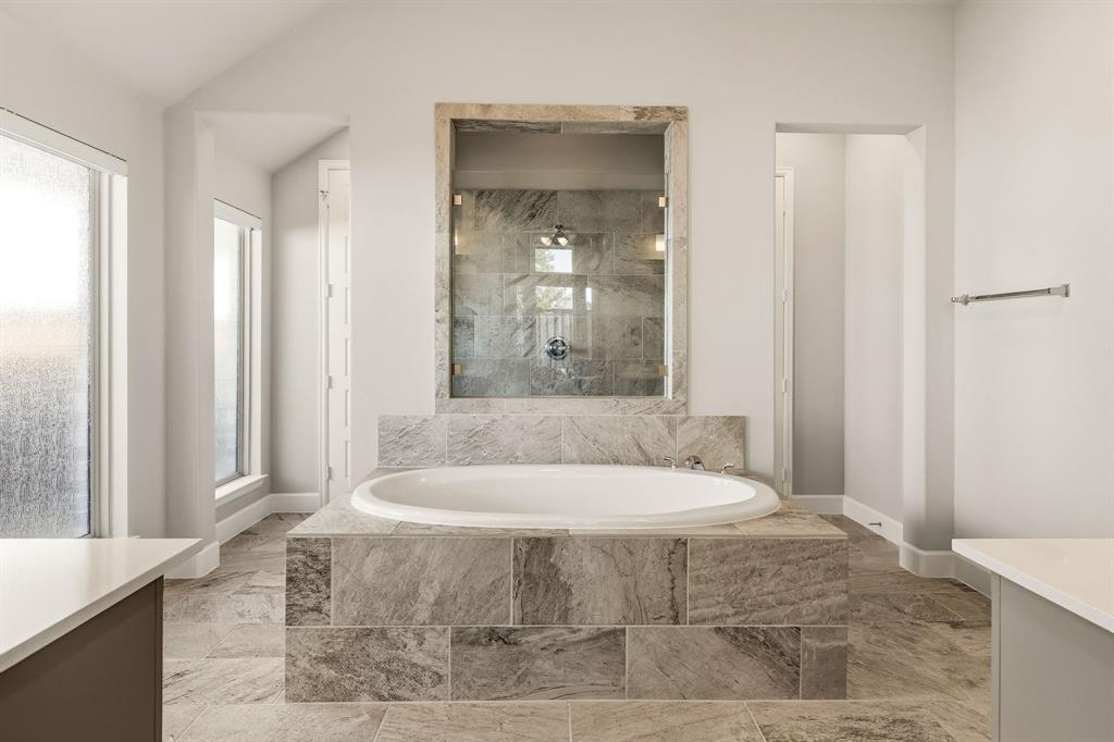 Garden tub and 2 walk-in closets.
