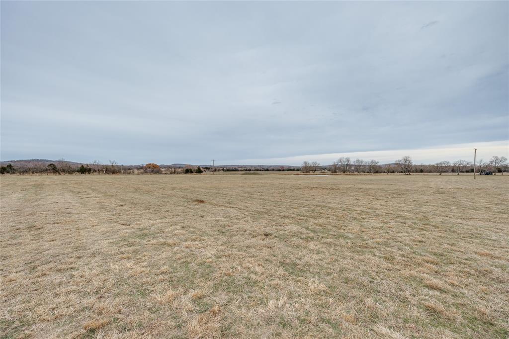 View of grassy yard featuring a view of countryside