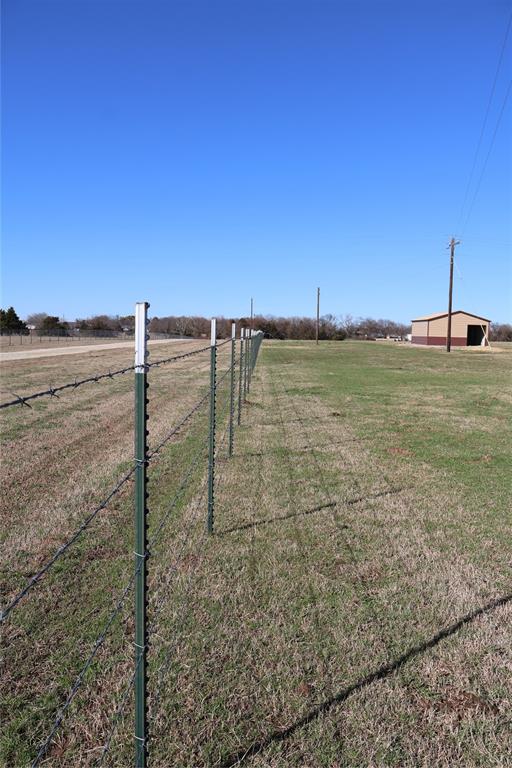 View of grassy yard featuring a view of countryside