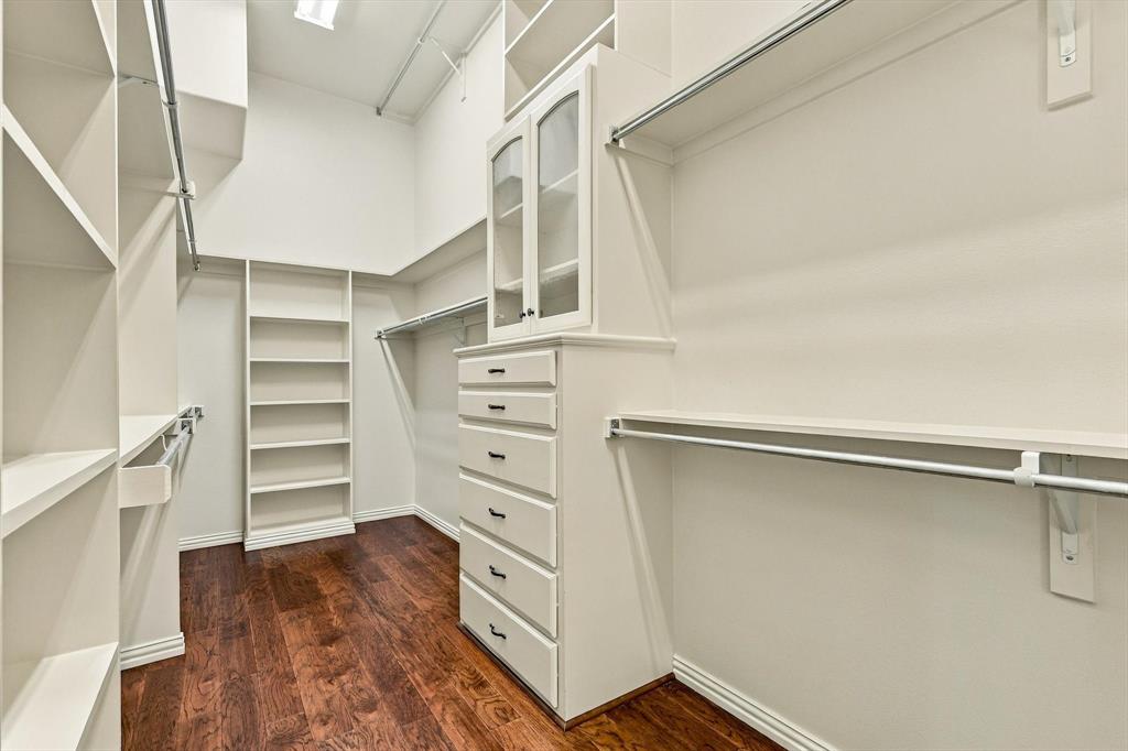 Large Walk-In Primary Closet.