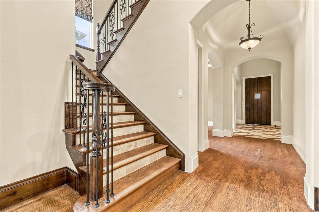 Arched Ceilings. Hardwood Floors. Tile With Inlay. Arched Ceilings. Hardwood Floors. Tile With Inlay.