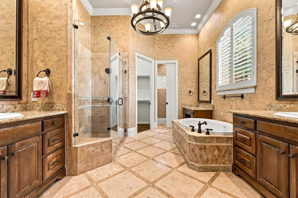 Separate Vanities, Make-Up Desk, Large Shower, Huge Tub, And Walk In Closet.