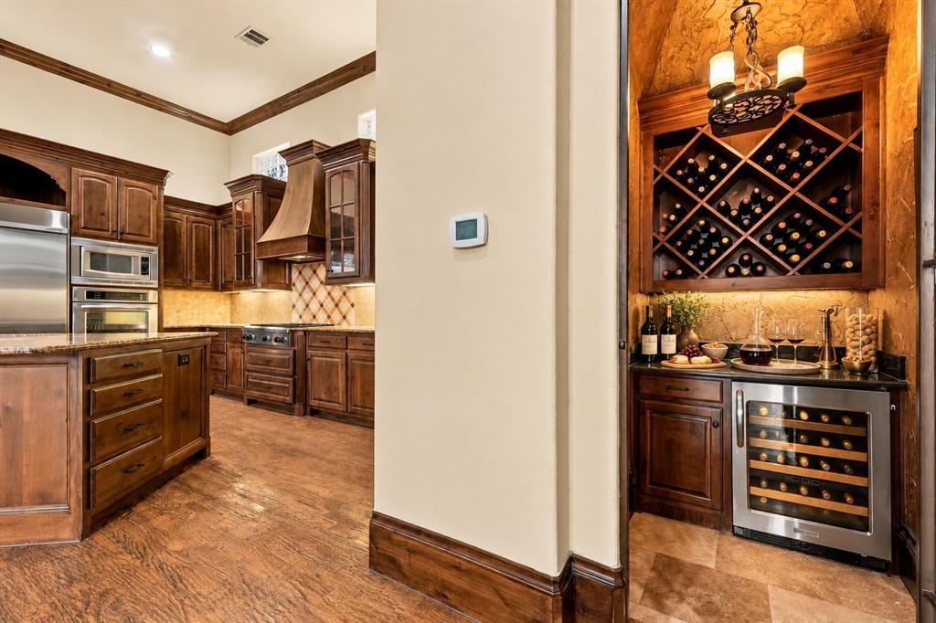 Adjacent To The Kitchen And Living Area Is A Wine Grotto.
