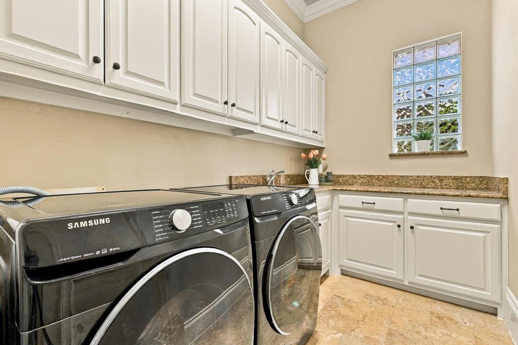 Laundry Room On The First Level And Adjacent To The Kitchen.