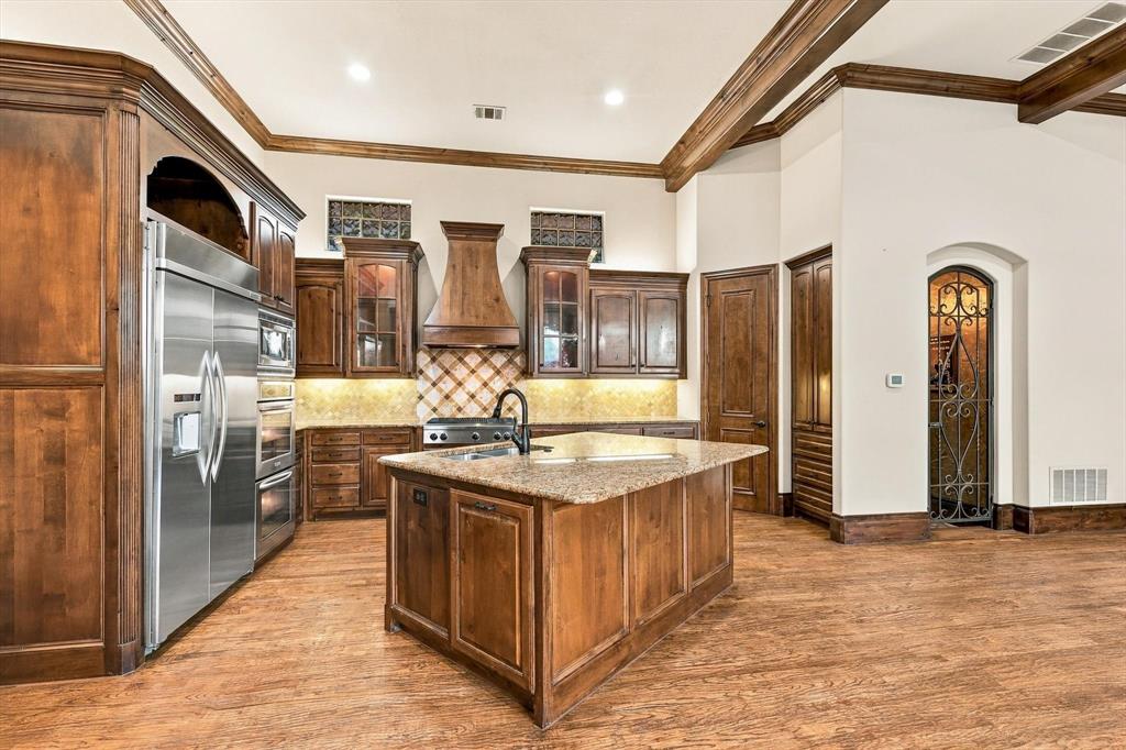 KitchenAid Appliances, Large Serving Island, Plenty Of Custom Cabinets.