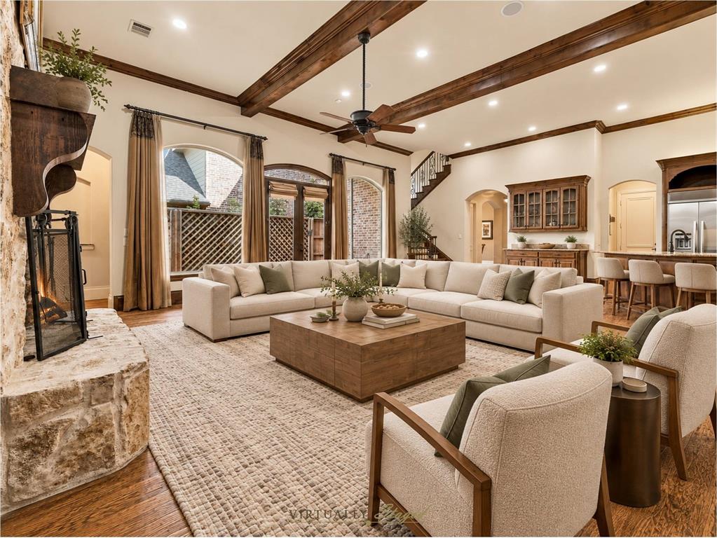 Large Living Area With Fireplace, Built-Ins, Beamed Ceiling, And Access To The Side Patio. Large Living Area With Fireplace, Built-Ins, Beamed Ceiling, And Access To The Side Patio.