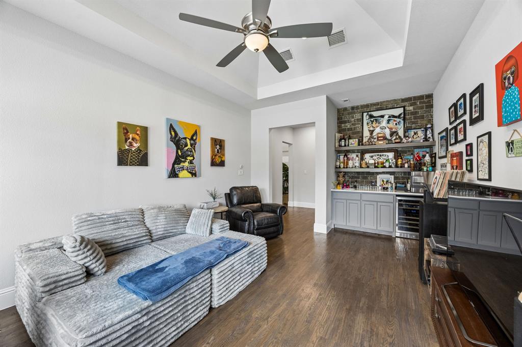 Second living room that looks over the pool