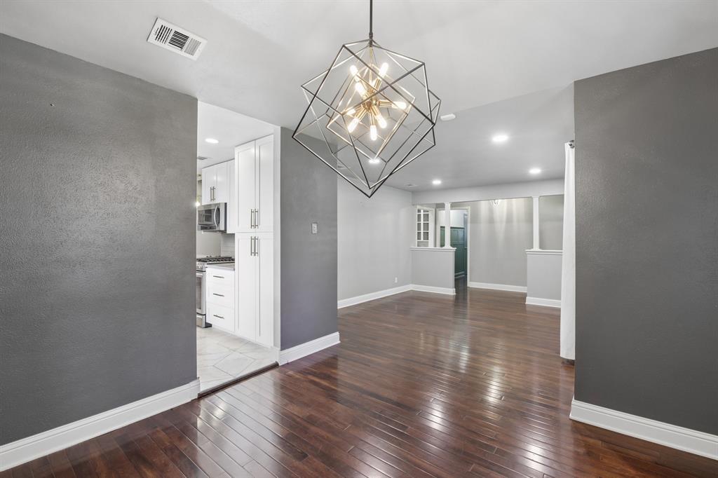 Formal dining/living looking into kitchen