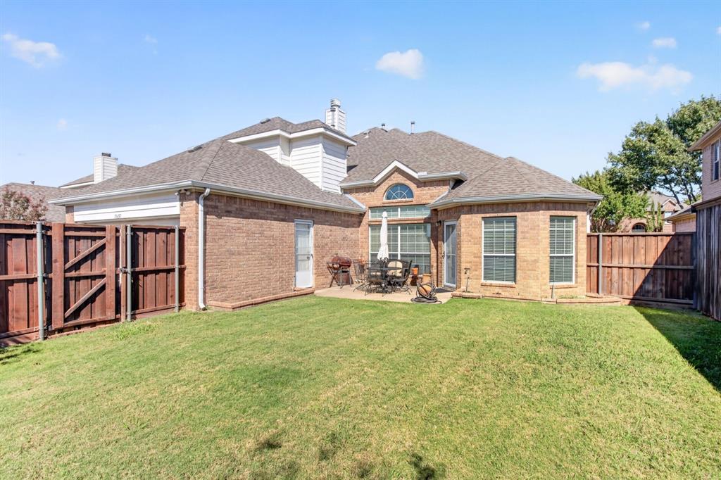 Wide backyard view with a grassy lawn, wood privacy fence and space to enjoy the outdoors. Wide backyard view with a grassy lawn, wood privacy fence and space to enjoy the outdoors.