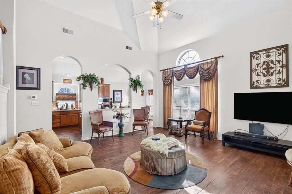 Spacious living area showing the connection to the formal rooms.
