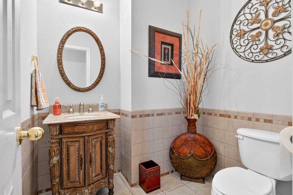 Half bathroom with a furniture-style vanity.
