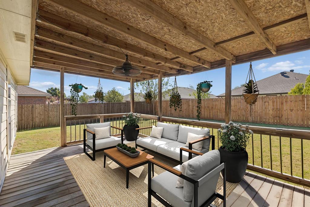 Enjoy the spacious covered patio just off the back door, complete with a ceiling fan and overlooking a huge backyard perfect for relaxing or entertaining! Enjoy the spacious covered patio just off the back door, complete with a ceiling fan and overlooking a huge backyard perfect for relaxing or entertaining!