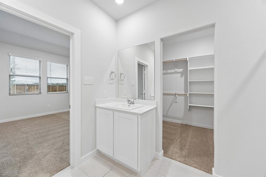Primary Bathroom in the Cedar home plan – REPRESENTATIVE PHOTO
