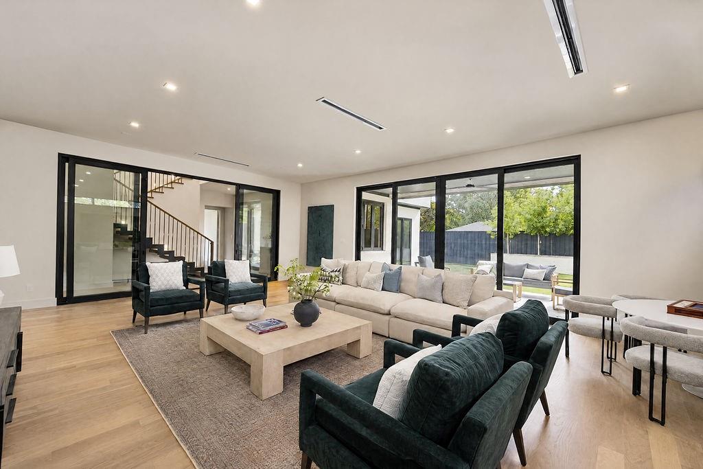 Enjoy a quiet movie night or host effortless indoor-outdoor hangouts as natural light pours through expansive glass doors