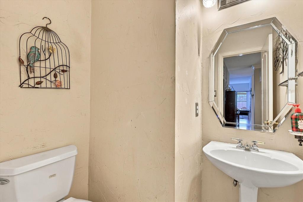 Downstairs powder room perfect for guests.