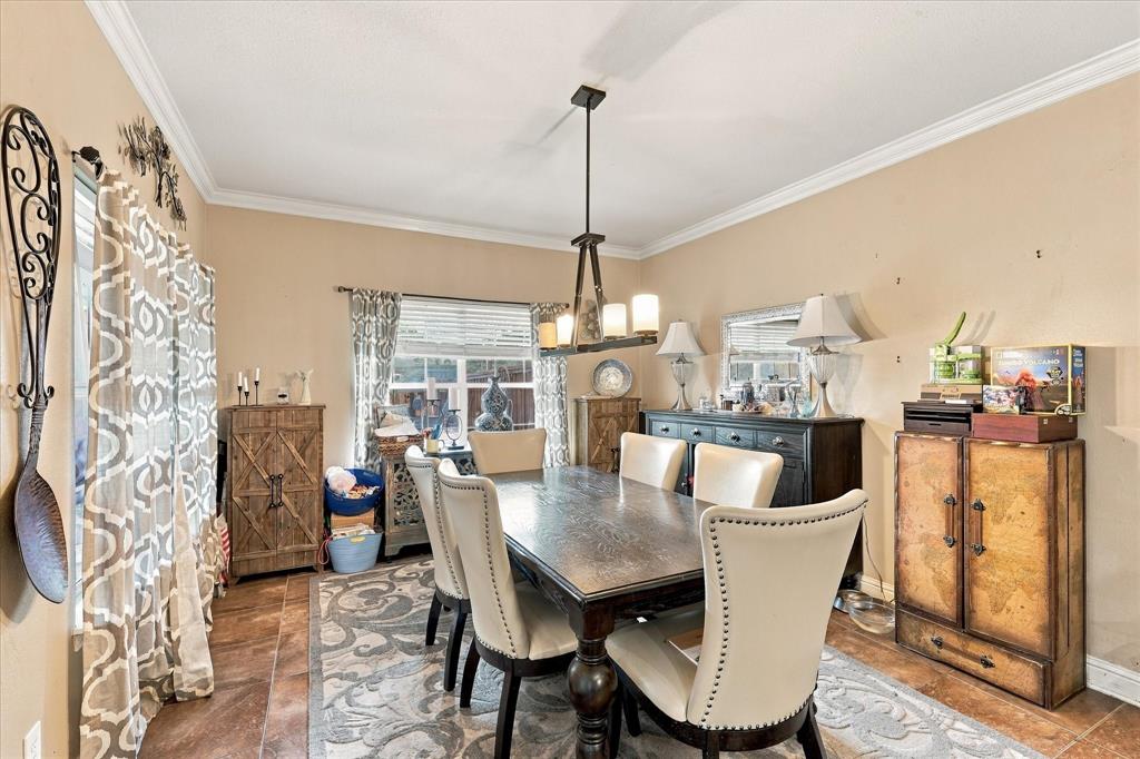 Well-lit breakfast area right off the kitchen with room for a buffet!
