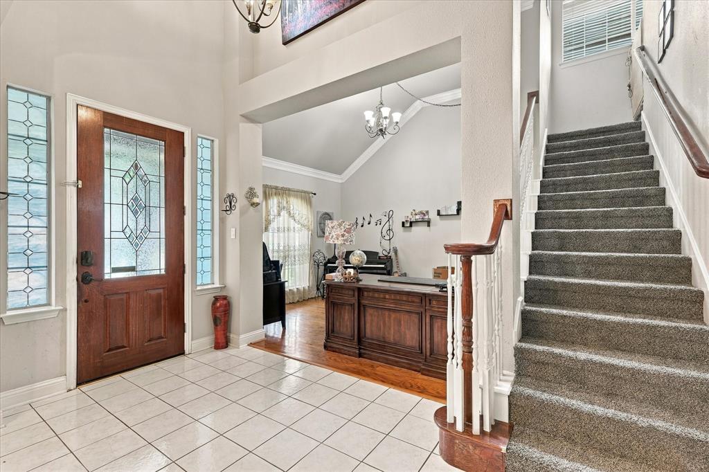 An entryway into your domain with a flex space for an office, sitting room, or perfect music room.