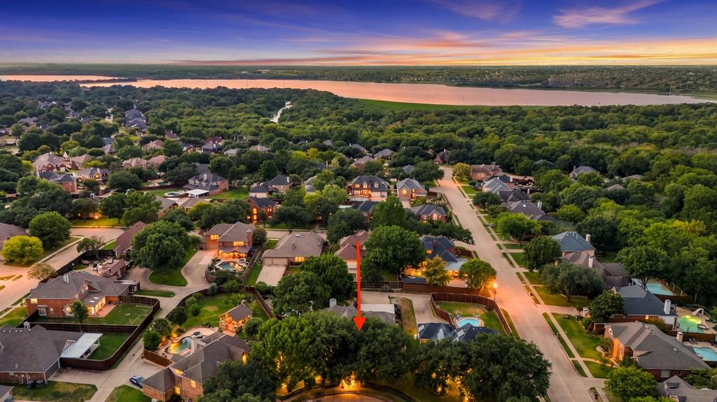 Imagine living in this mature, cozy lakeside community.