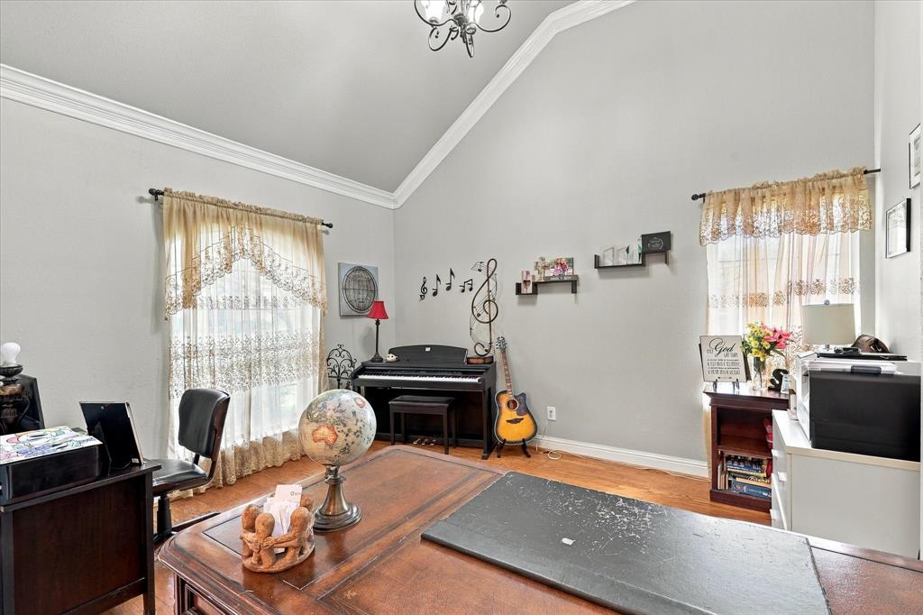 Vaulted ceilings in the office / flex space with windows on both walls for lots of natural light.