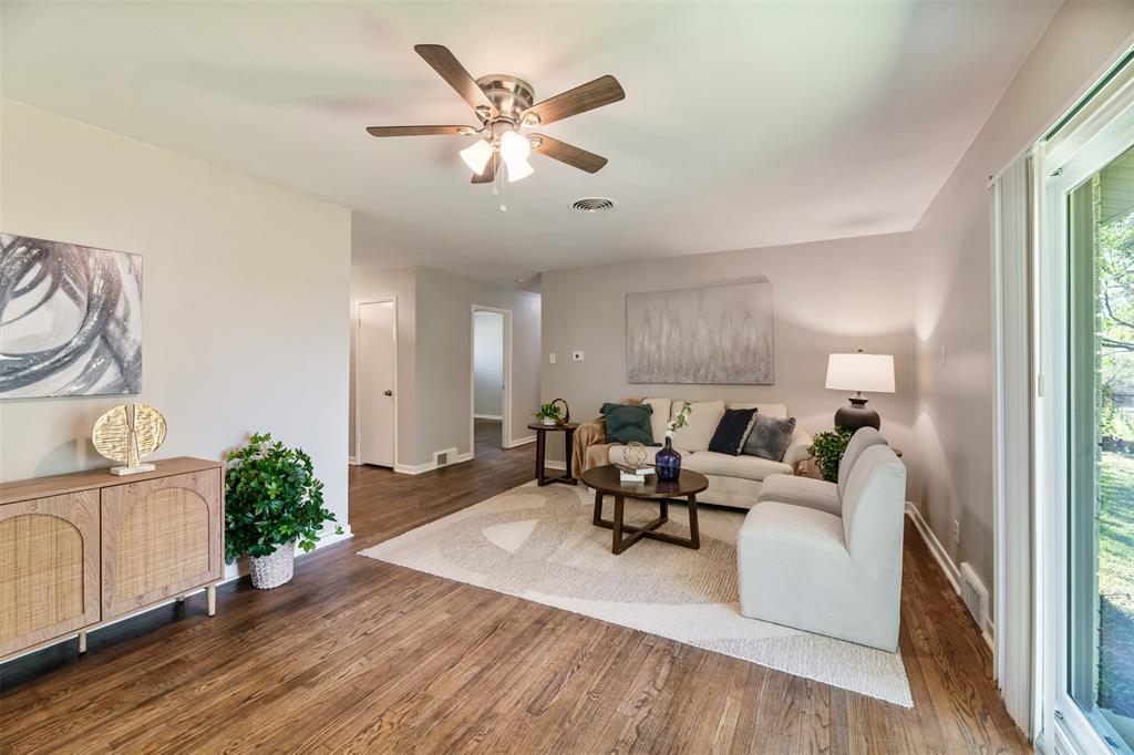 Beautiful hardwood floors have been resorted and are in the living area and bedrooms.