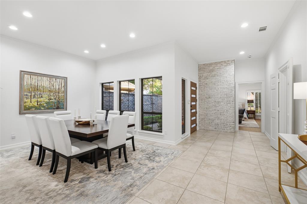 The dining room opens to the foyer and gallery hall for a gracious, flowing first impression.