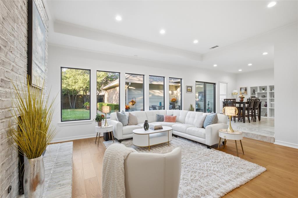 The living room flows into the breakfast nook and kitchen, so the host is never out of the conversation.