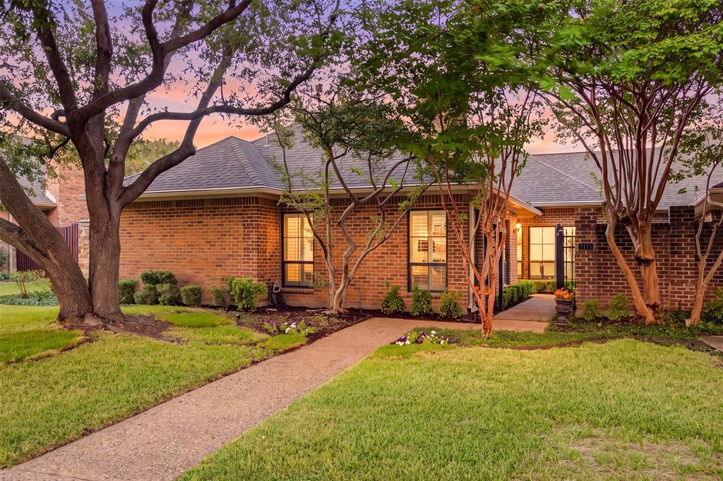 Golden-hour curb appeal! Classic brick, mature shade trees, and a winding walk welcome you to this single-story half-duplex. Golden-hour curb appeal! Classic brick, mature shade trees, and a winding walk welcome you to this single-story half-duplex.