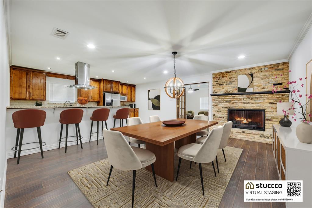 This dining area is great for entertaining w/fireplace