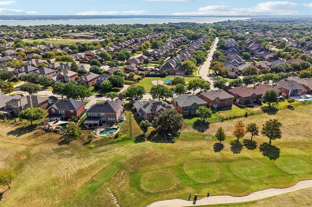 Aerial View of back of home with golf course