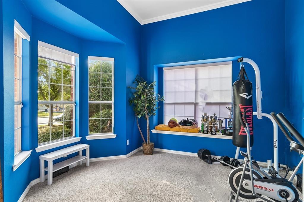 Front Room - formal living space or currently being used as an workout room