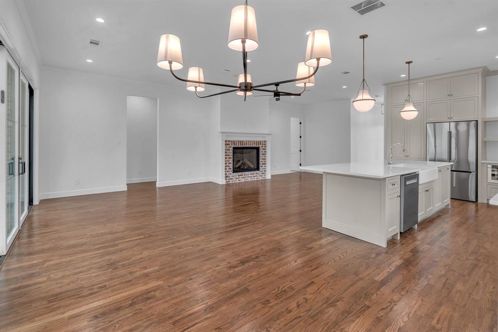 Wide open living area with gas fireplace