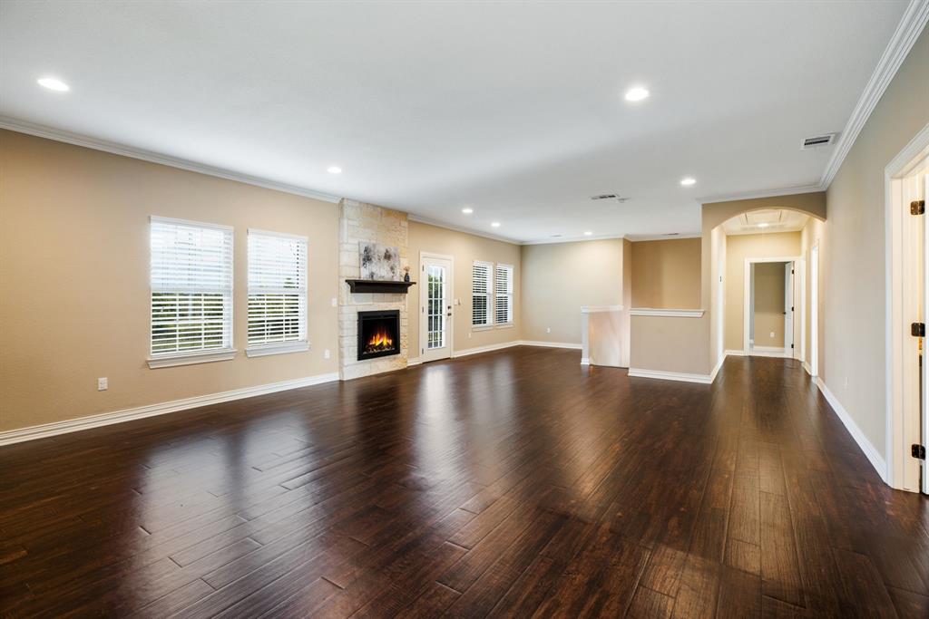 Living space or Bonus Room you choose.  Step out the door and find yourself looking over the stunning pond.
